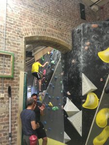 Image shows climbing walls between and around original brick features of the water pumping station