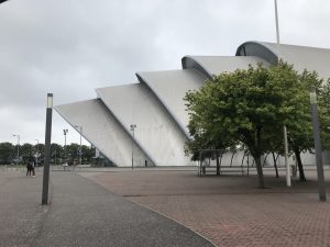 Photograph shows the side of The SEC, the building is shaped like an armadillo shell.