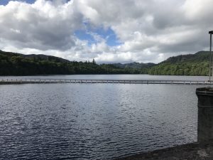 Photograph taken from the top of the dam looking towards the river tunnel and Loch Faskelly