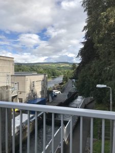 Photograph taken from the top of the fish ladder, showing it move down in stages like the gates on a canal