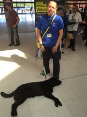 Tee stood in Cascade Shopping Centre on the campaign day with Fizz laid on the floor at my feet.