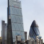 An image of the London Skyline, showing The Cjeesegrater with The Gherkin to the right and The Lloyds building in the foreground.