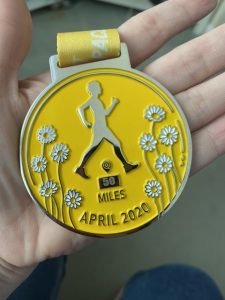 Yellow medal staring 50 miles walked